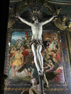 Le tableau « La montée au calvaire », visible dans la latérale droite de l'église de l’Immaculée Conception à Bastia, derrière le Christ en croix.