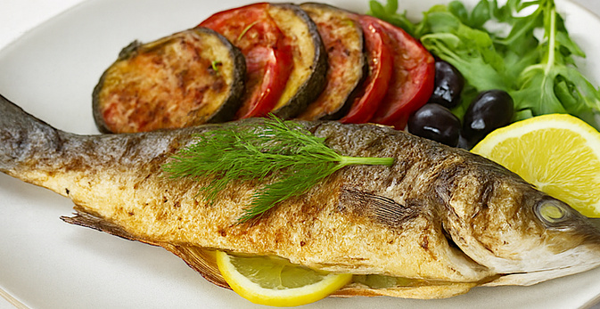 À table : loup de mer grillé et tian de légumes