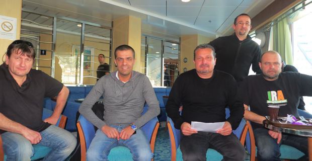 Alain Mosconi, secrétaire général, entouré de marins du STC, à bord du Pascal Paoli.