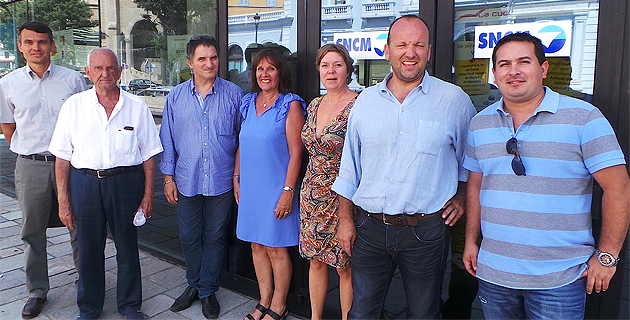 Jean-Marc Cesarini (Deuxième à partir de la droite) lance un appel aux handicapés qui ont besoin d'être aidés dans leur quotidien